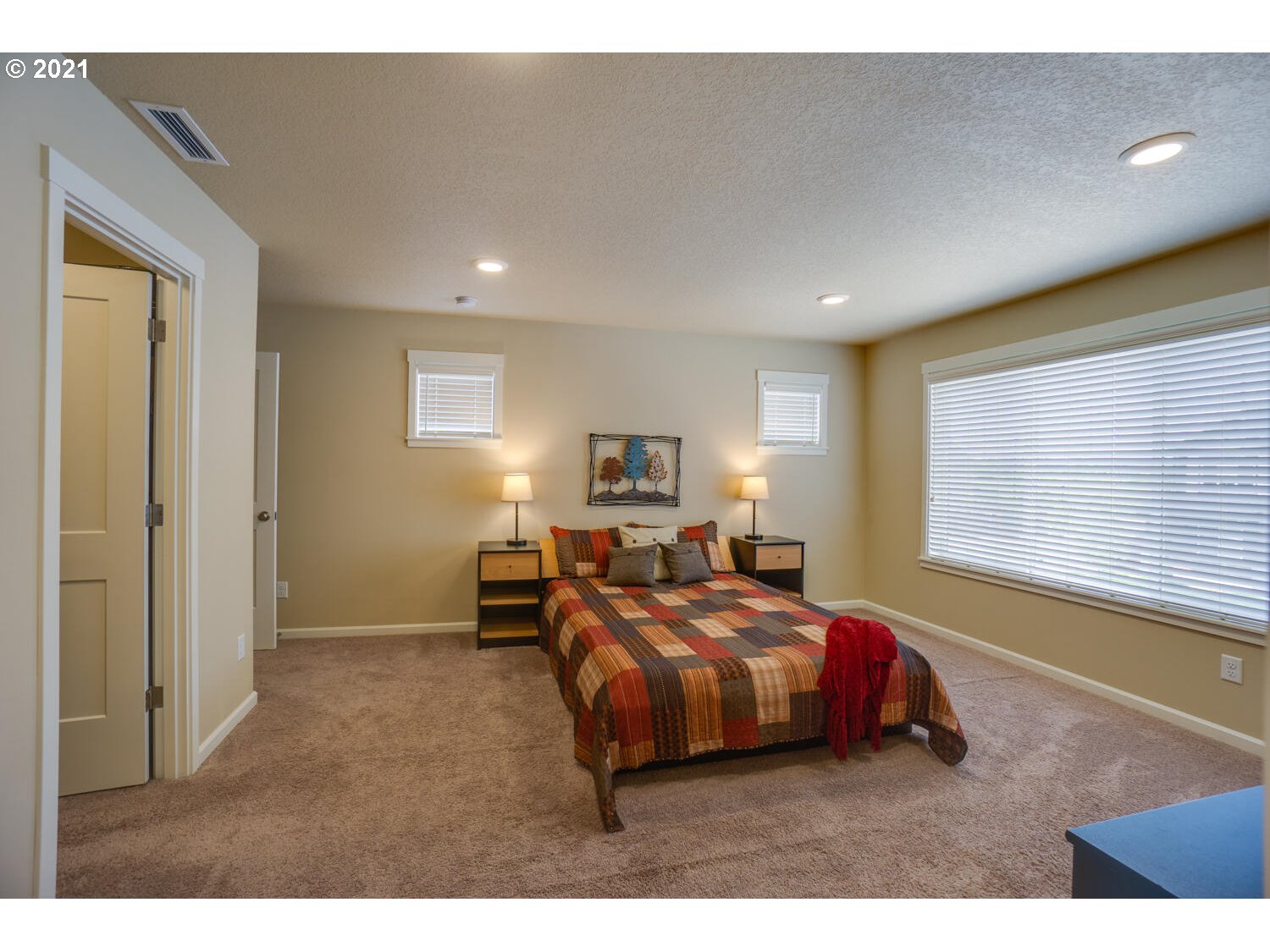 4639 North Noble Loop Ridgefield, WA 98642 - Photo 18 of 32 a bedroom with furniture and a window