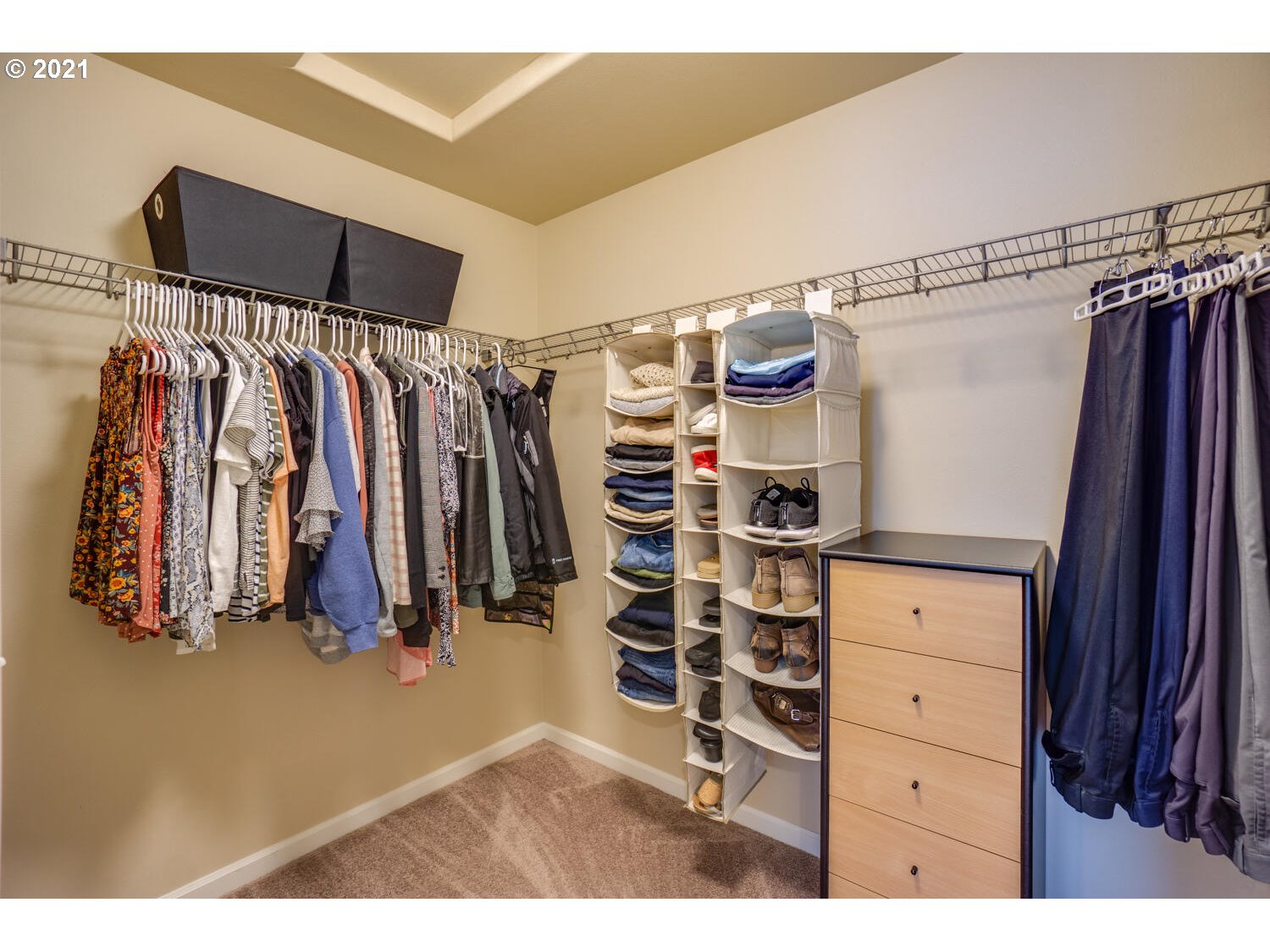 4639 North Noble Loop Ridgefield, WA 98642 - Photo 19 of 32 a view of walk in closet with clothes and shoes