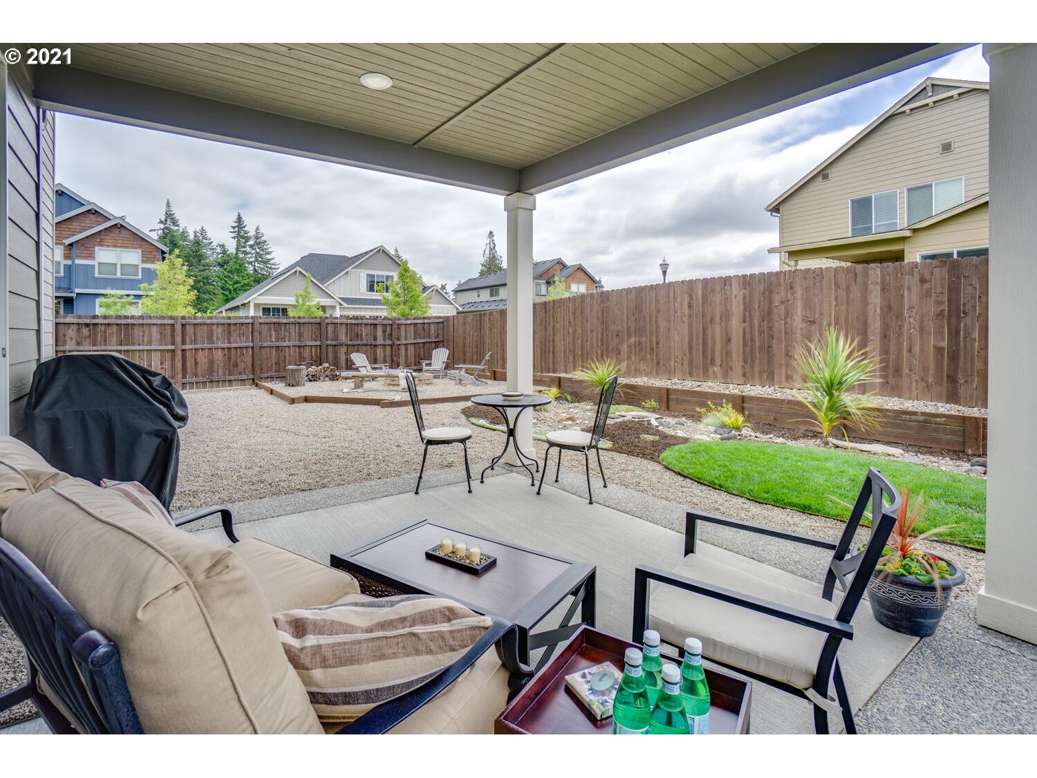 4639 North Noble Loop Ridgefield, WA 98642 - Photo 26 of 32 a view of a patio with couches chairs and a table and chairs