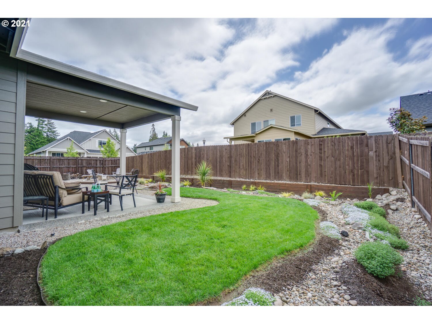 4639 North Noble Loop Ridgefield, WA 98642 - Photo 27 of 32 a view of backyard with seating and green space