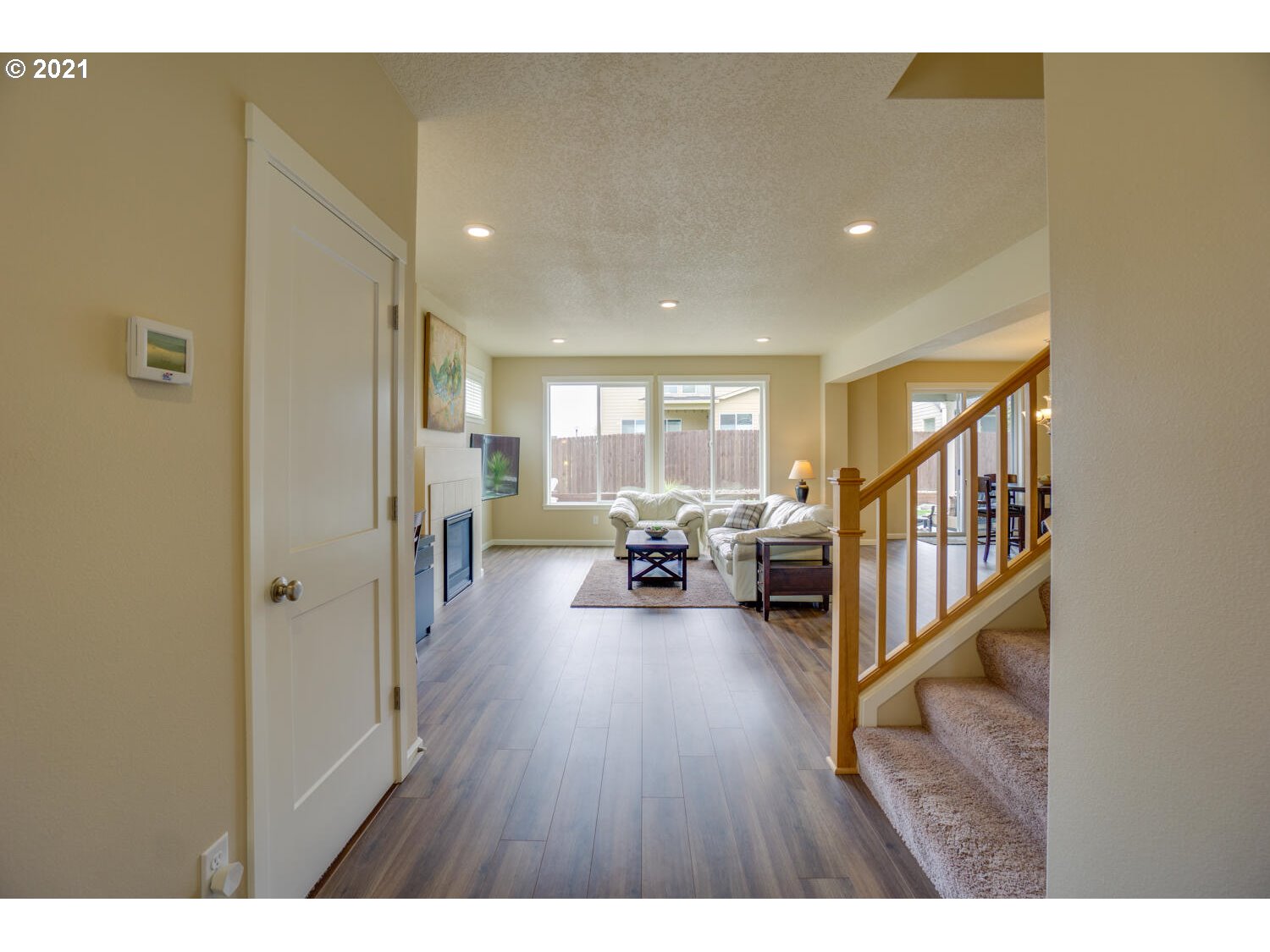 4639 North Noble Loop Ridgefield, WA 98642 - Photo 4 of 32 a living room with furniture and a wooden floor