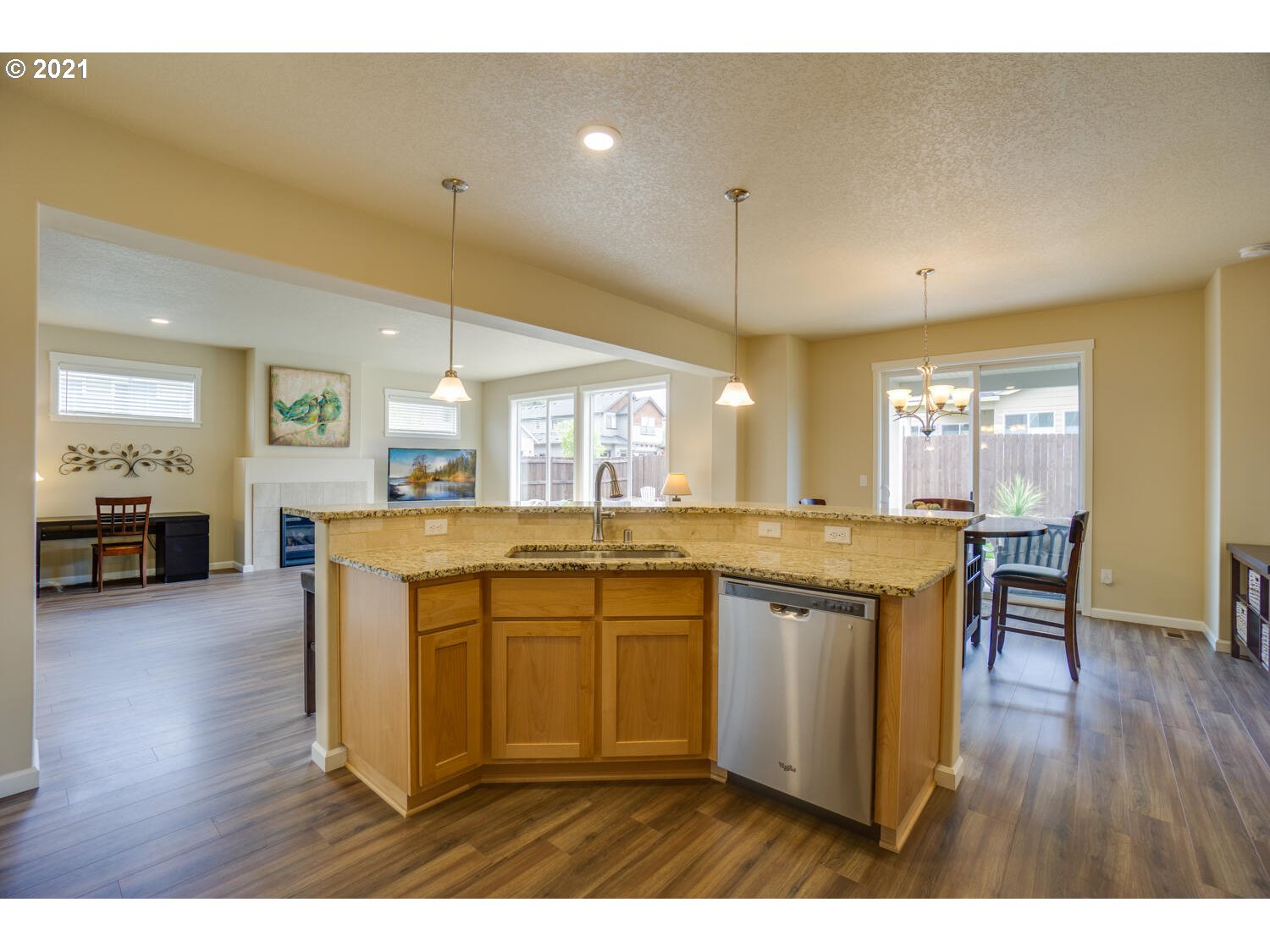 4639 North Noble Loop Ridgefield, WA 98642 - Photo 10 of 32 a open kitchen with a sink and cabinets