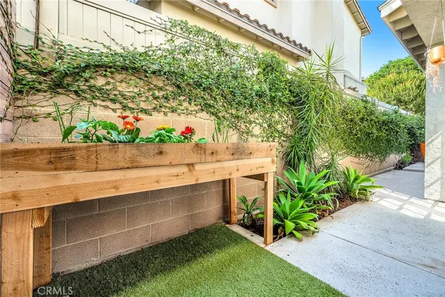 a view of backyard with seating and green space