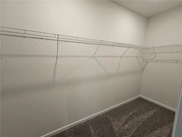 a bathroom with a vanity and a shower