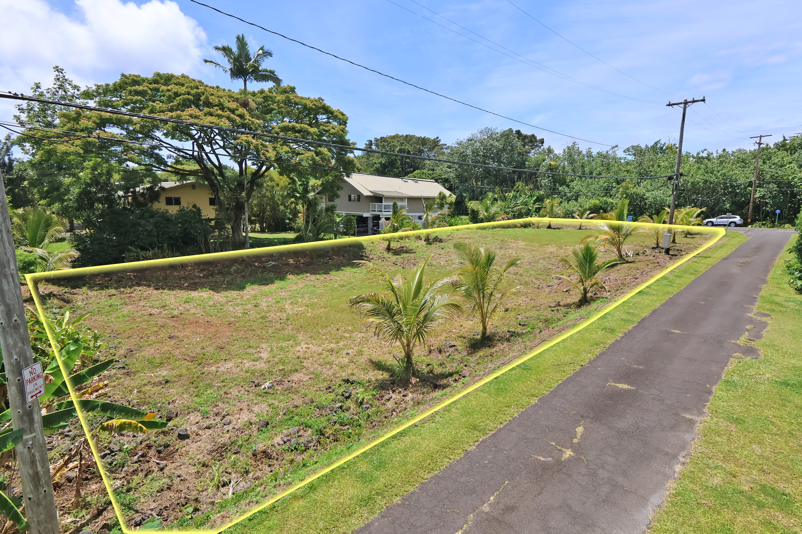 106 B Nene Street Hilo, HI 96720 - Photo 11 of 15 a view of a swimming pool with a yard