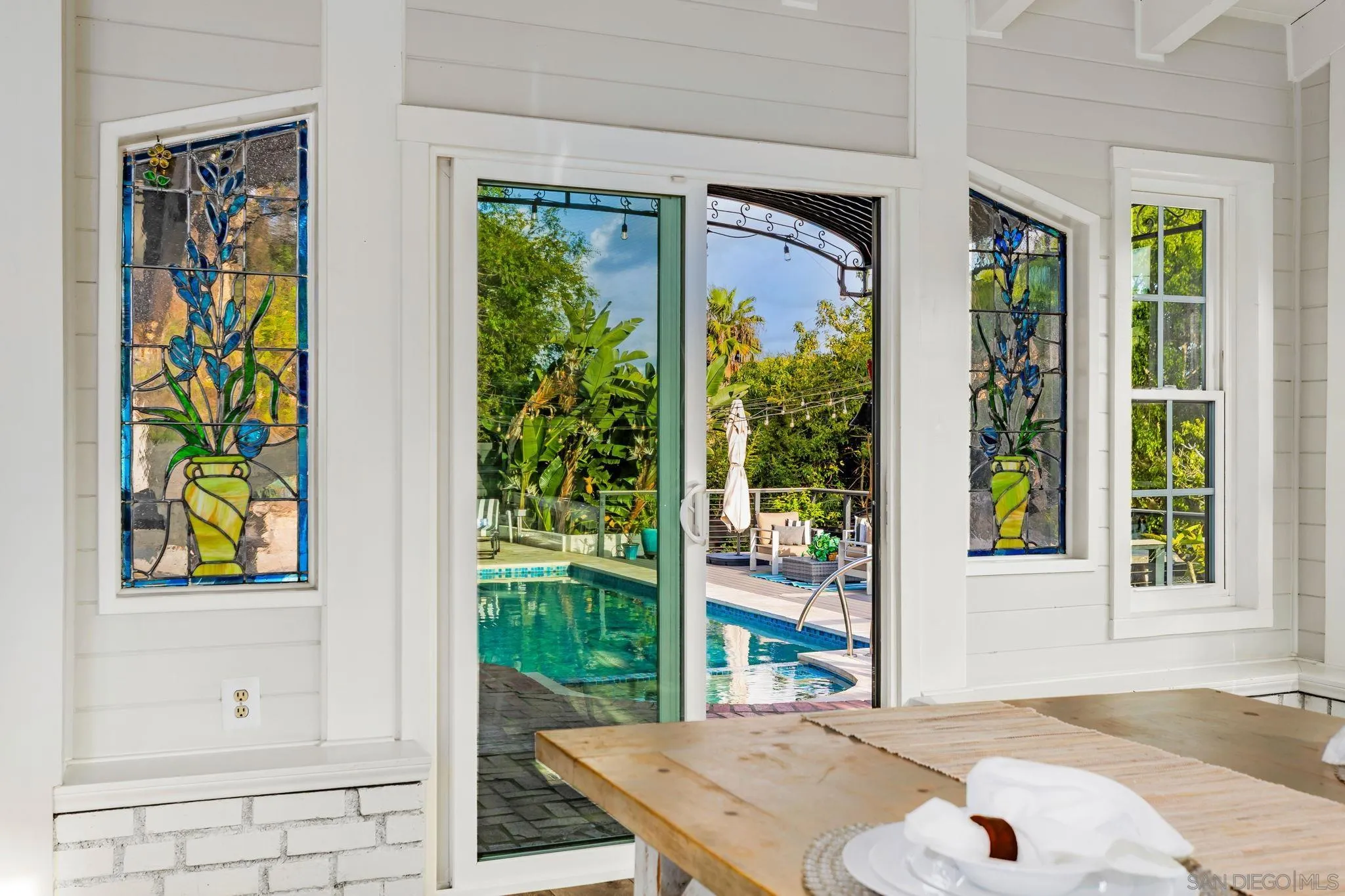2335 Ivy Road Oceanside, CA 92054 - Photo 9 of 53 a bedroom with a bed and a window