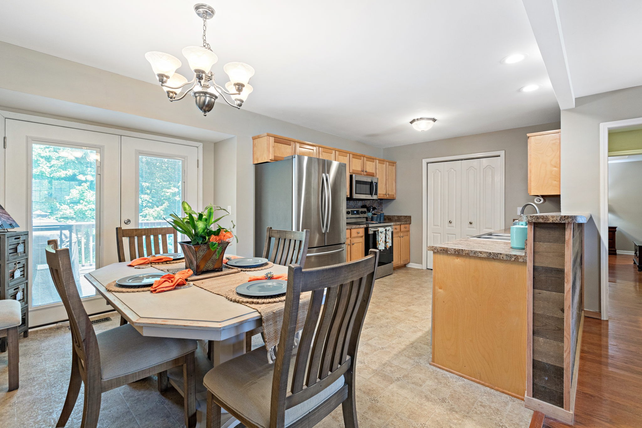 944 Pebble Beach Circle Mount Juliet, TN 37122 - Photo 5 of 19 a view of a dining room with furniture window and wooden floor