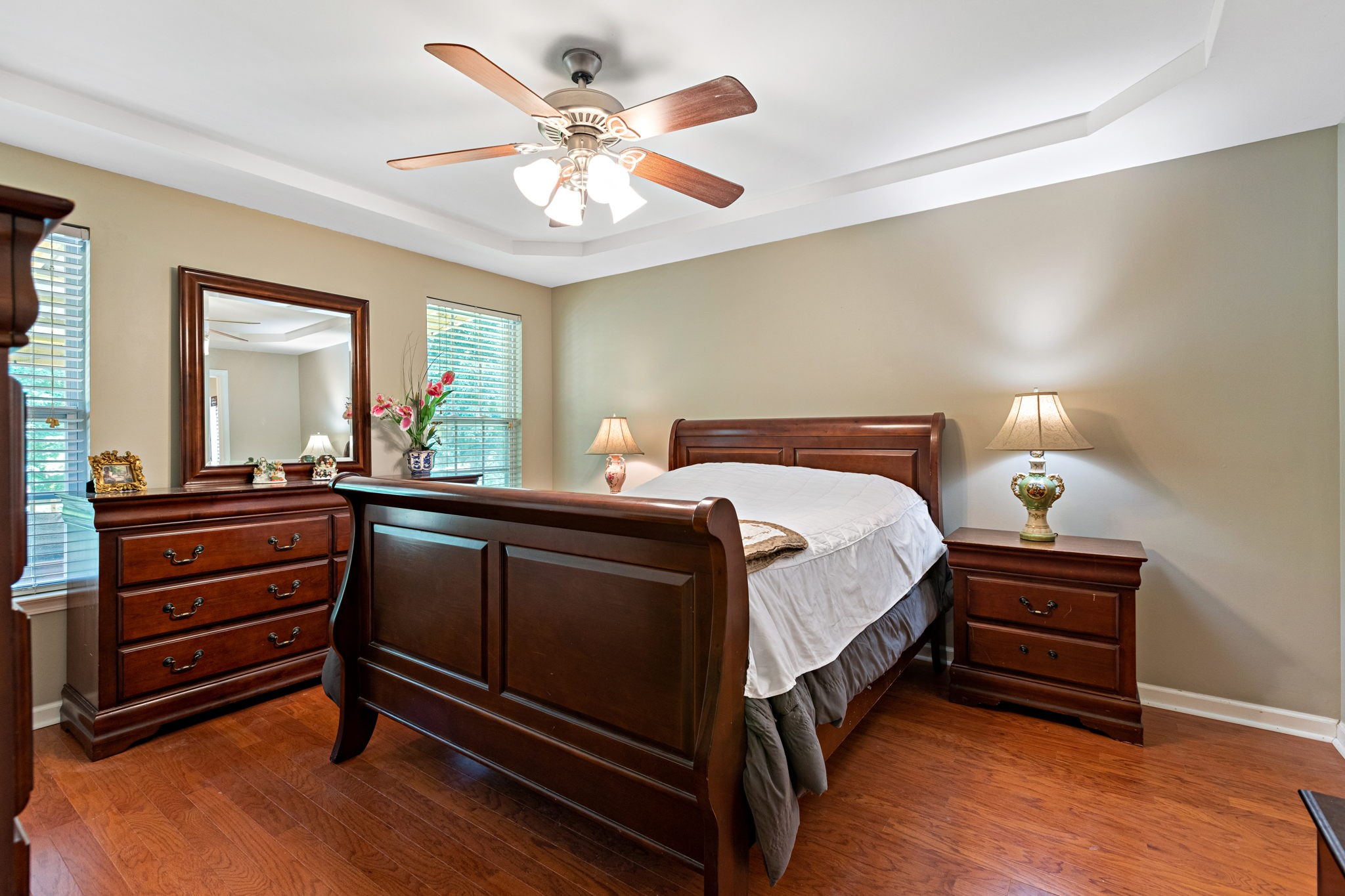 944 Pebble Beach Circle Mount Juliet, TN 37122 - Photo 8 of 19 a bedroom with a bed and a chandelier