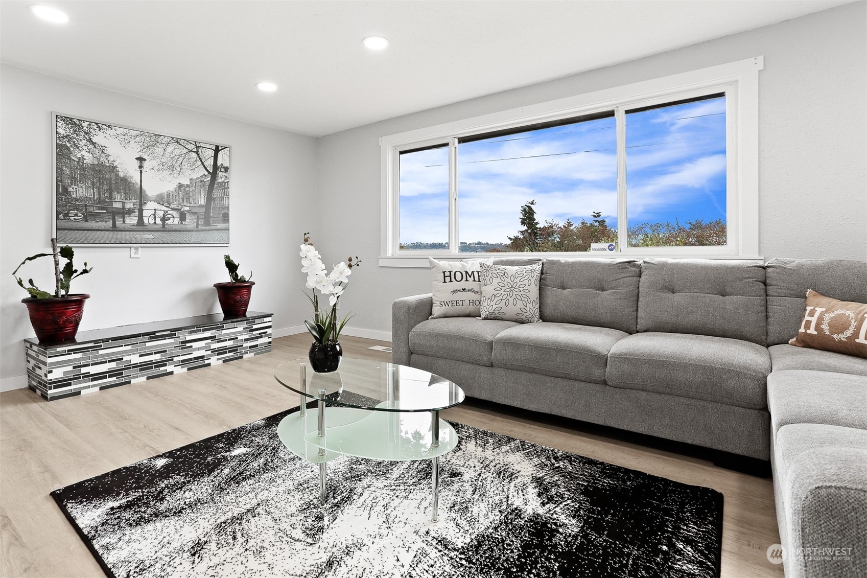 2124 High Avenue Northeast Renton, WA 98056 - Photo 18 of 37 a living room with furniture and a large window