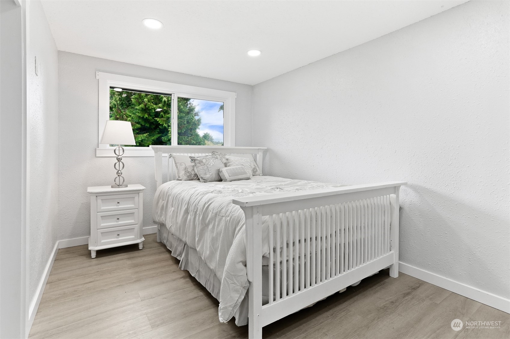 2124 High Avenue Northeast Renton, WA 98056 - Photo 21 of 37 a bedroom with a bed and a window