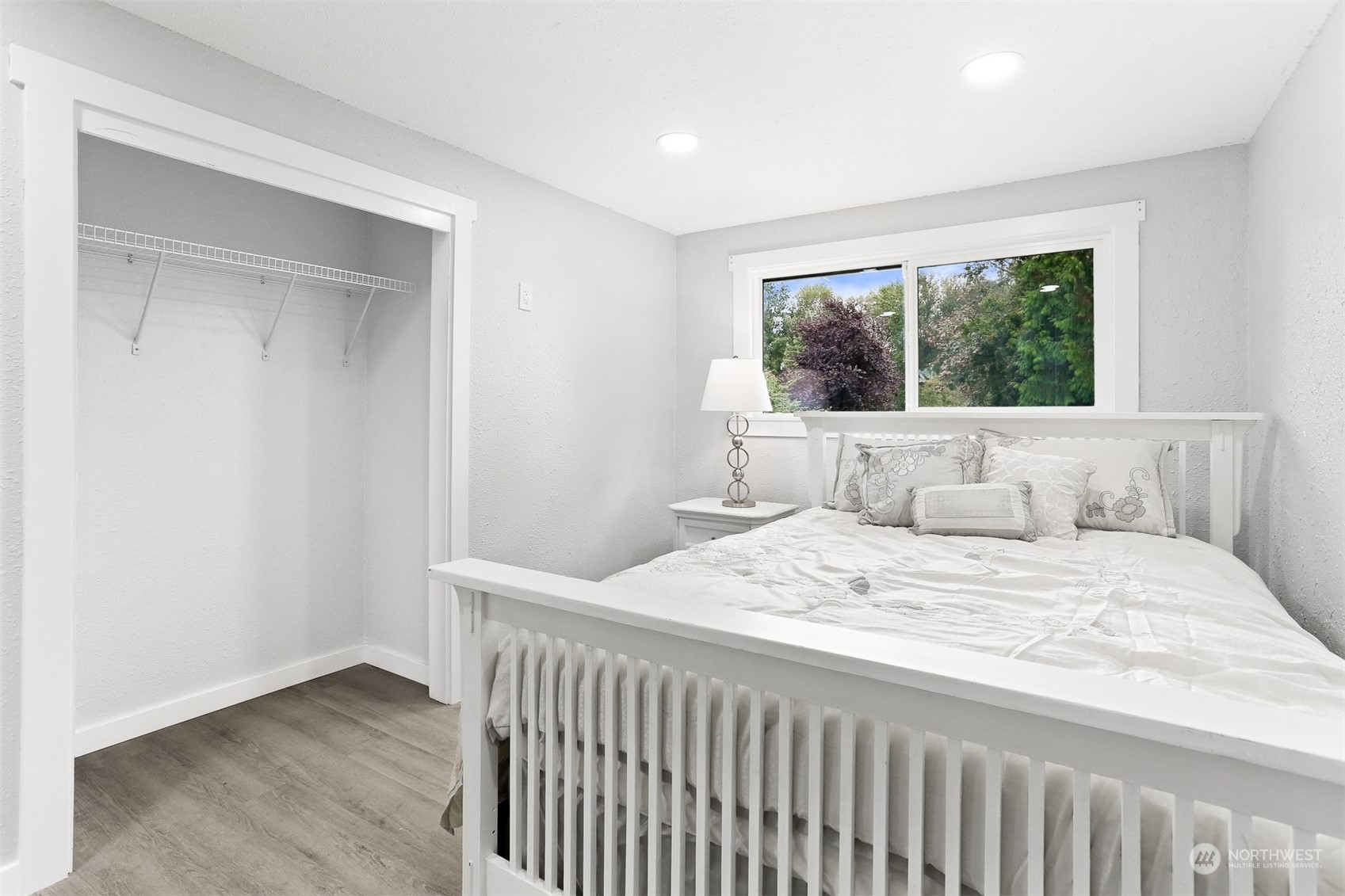 2124 High Avenue Northeast Renton, WA 98056 - Photo 22 of 37 a bedroom with a bed and a window