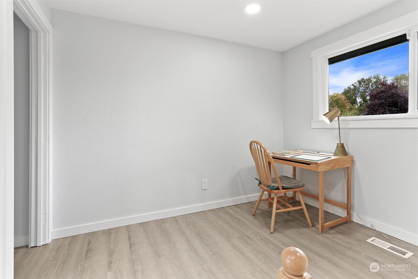 2124 High Avenue Northeast Renton, WA 98056 - Photo 25 of 37 a dining room with furniture and wooden floor
