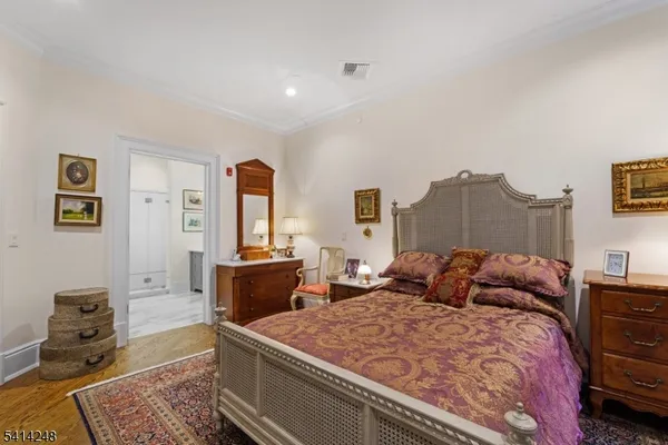 a bedroom with a bed and furniture