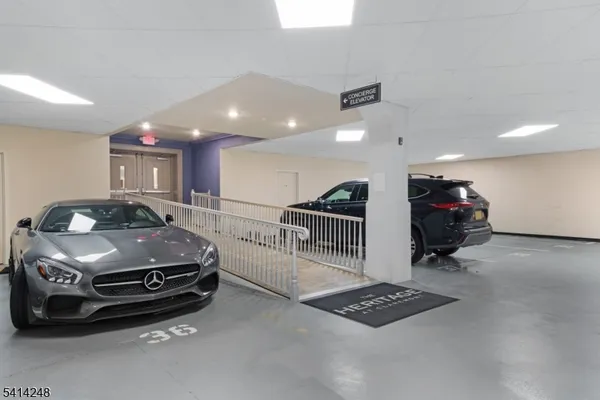 a car in garage with a couch