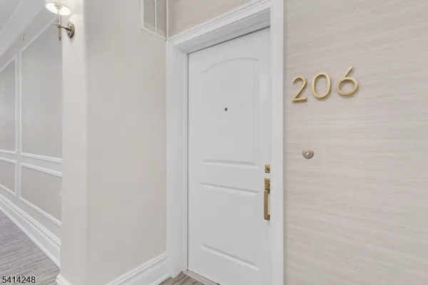 a bathroom with a glass door