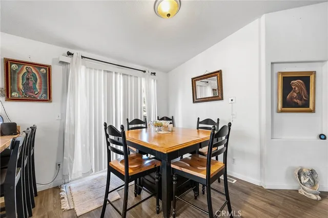 a view of a livingroom with furniture and wooden floor