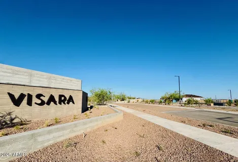 a sign board with parking space