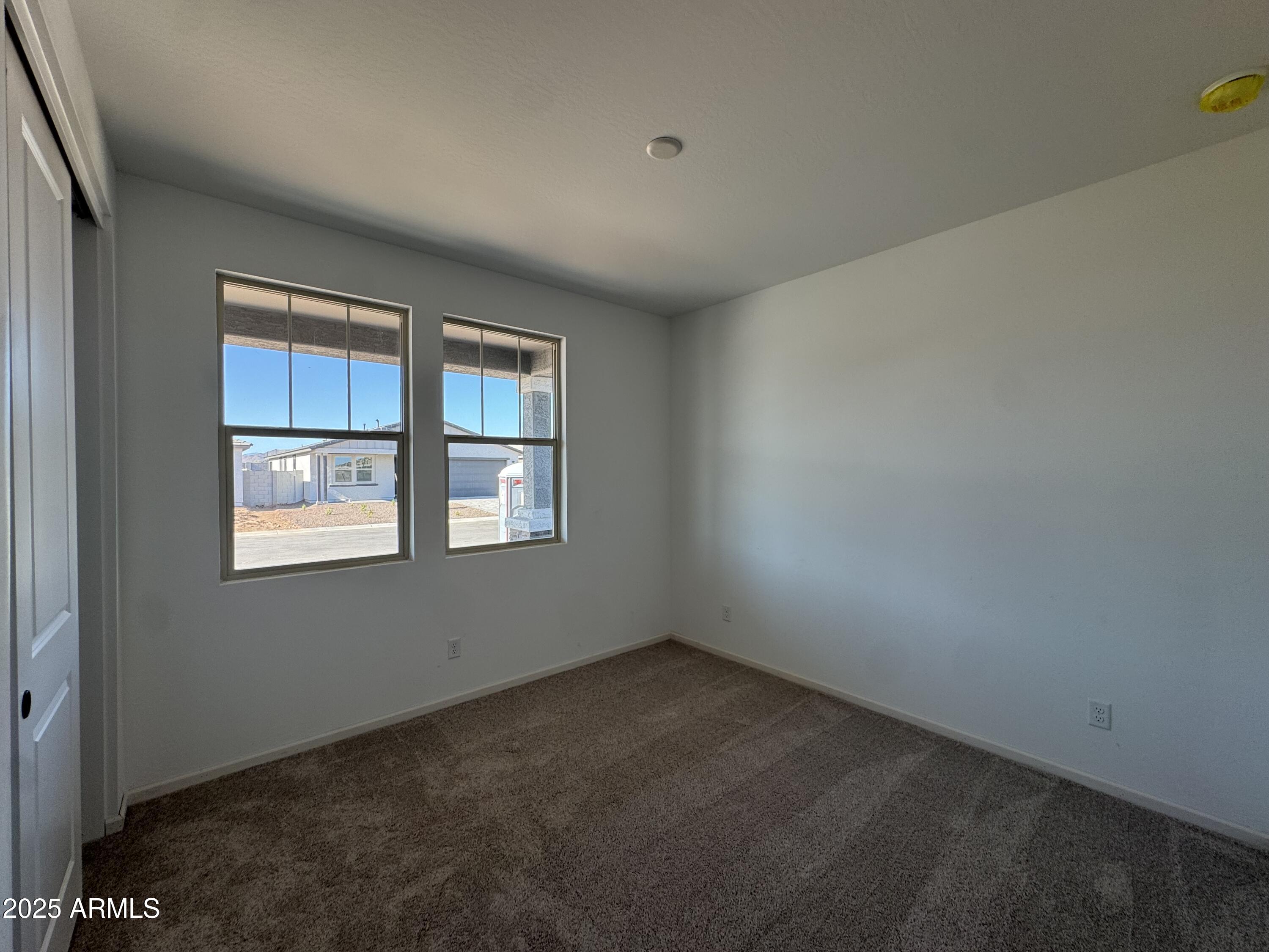 16181 West Bajada Road Surprise, AZ 85387 - Photo 3 of 21 an empty room with a window
