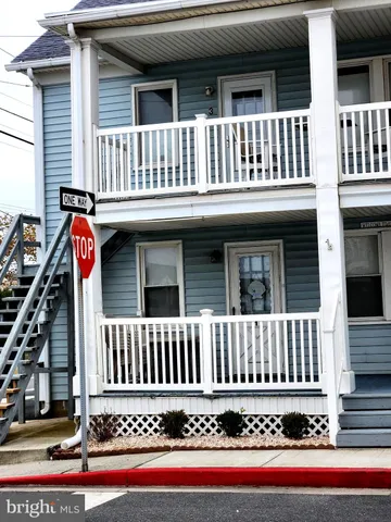 a view of a house with deck