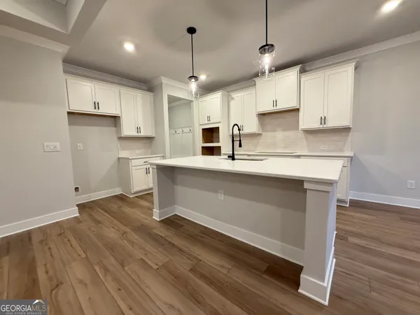 a bathroom with a tub and a shower
