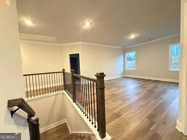 a front view of a house with parking