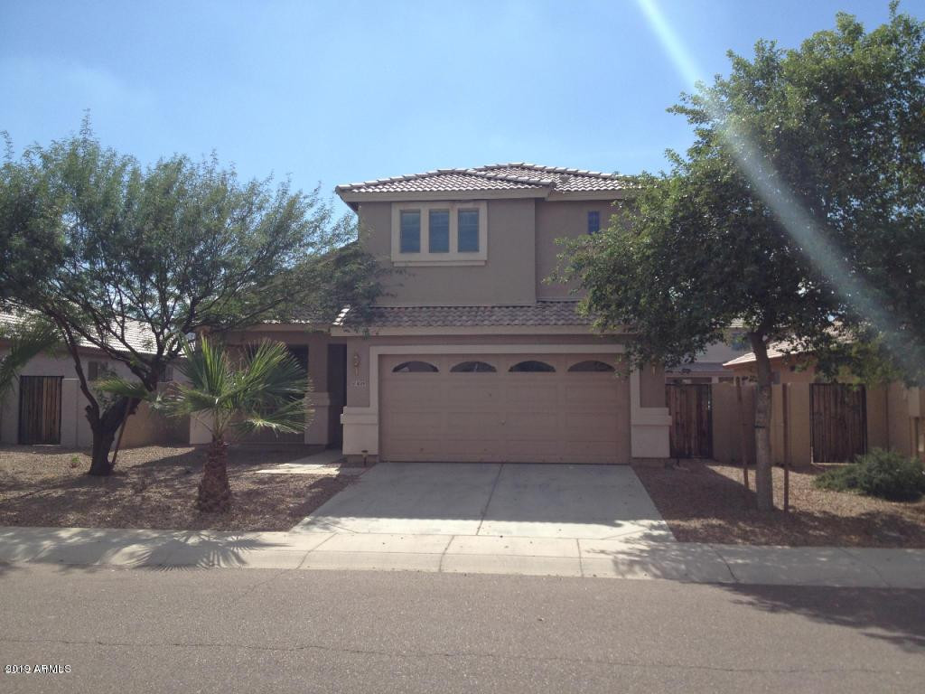 4319 West Darrel Road Laveen, AZ 85339 - Photo 3 of 16 a view of a house with a yard