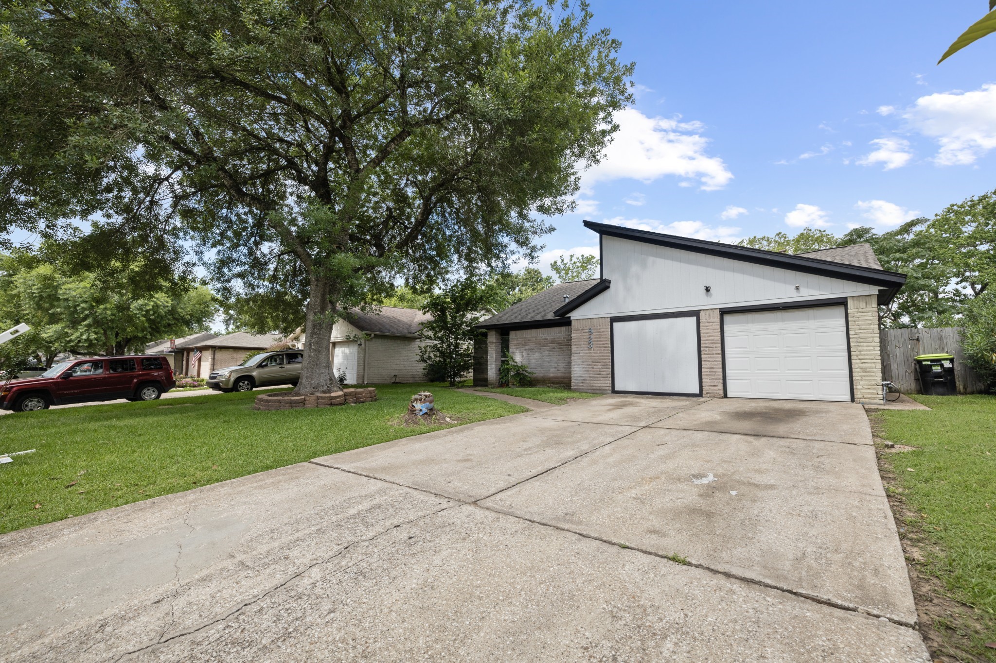 3823 Shadow Trail Houston, TX 77084 - Photo 4 of 29 a front view of house with yard and green space