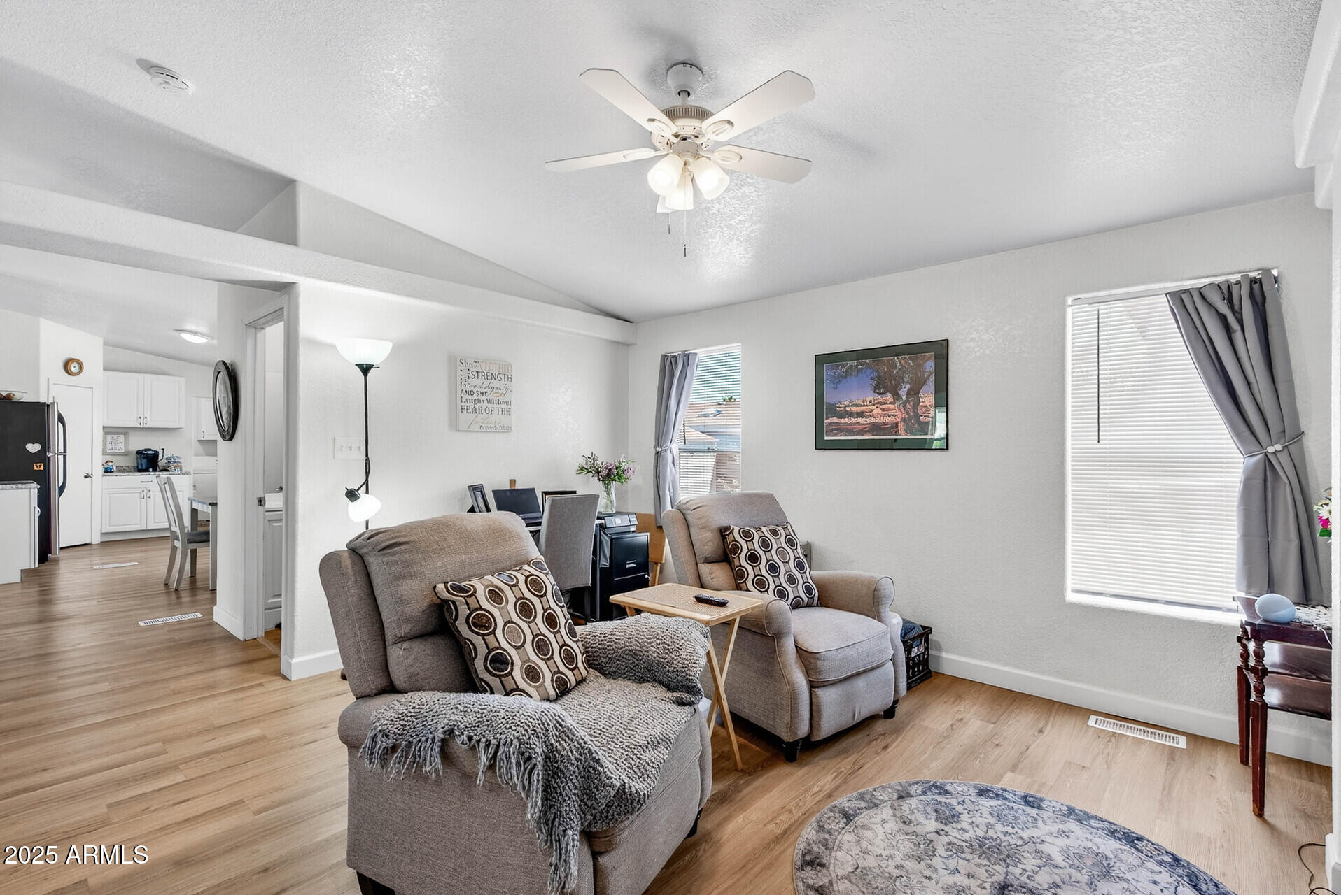 16101 North El Mirage Road, Unit 353 El Mirage, AZ 85335 - Photo 15 of 46 a living room with furniture and a window