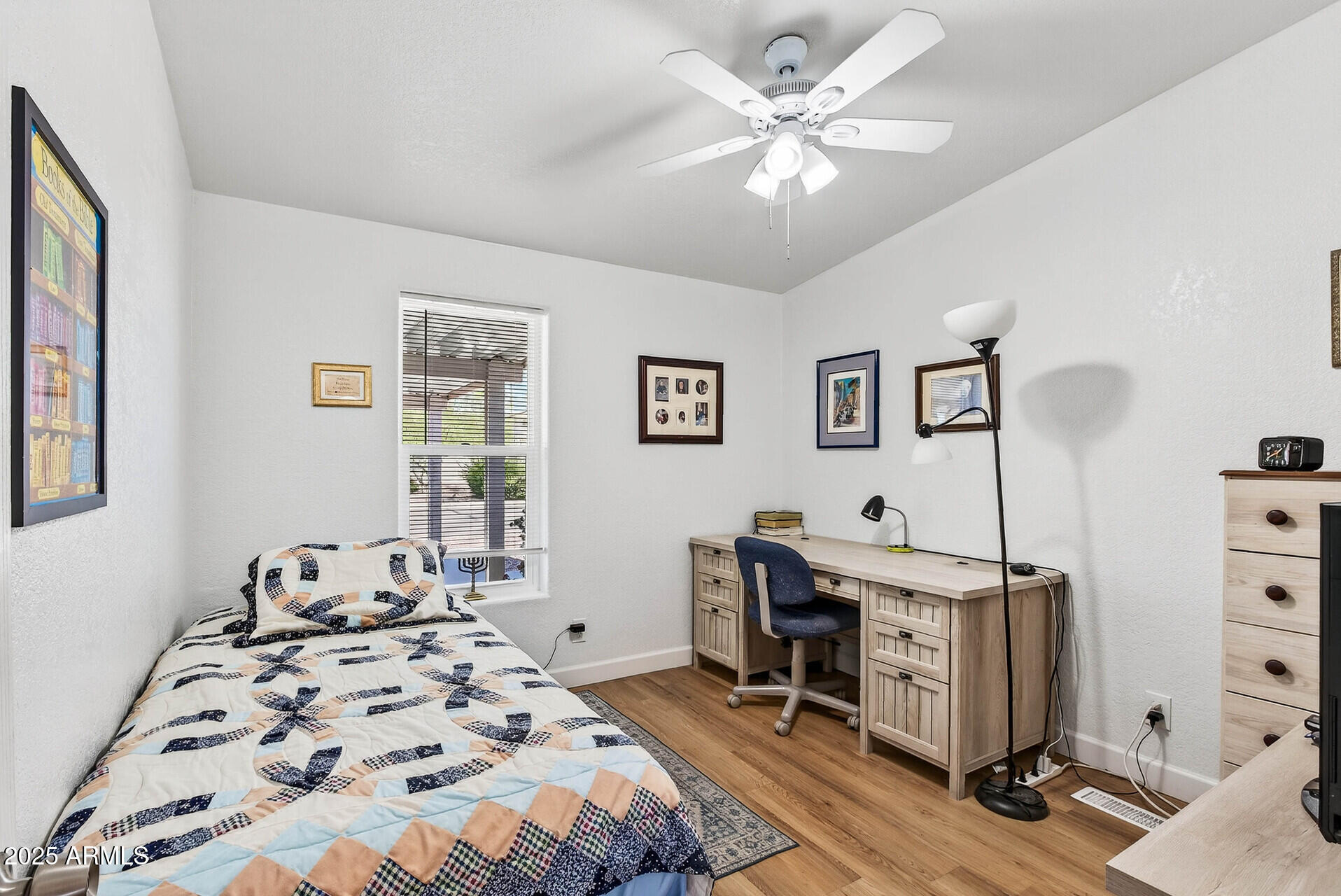 16101 North El Mirage Road, Unit 353 El Mirage, AZ 85335 - Photo 24 of 46 a bedroom with a workspace