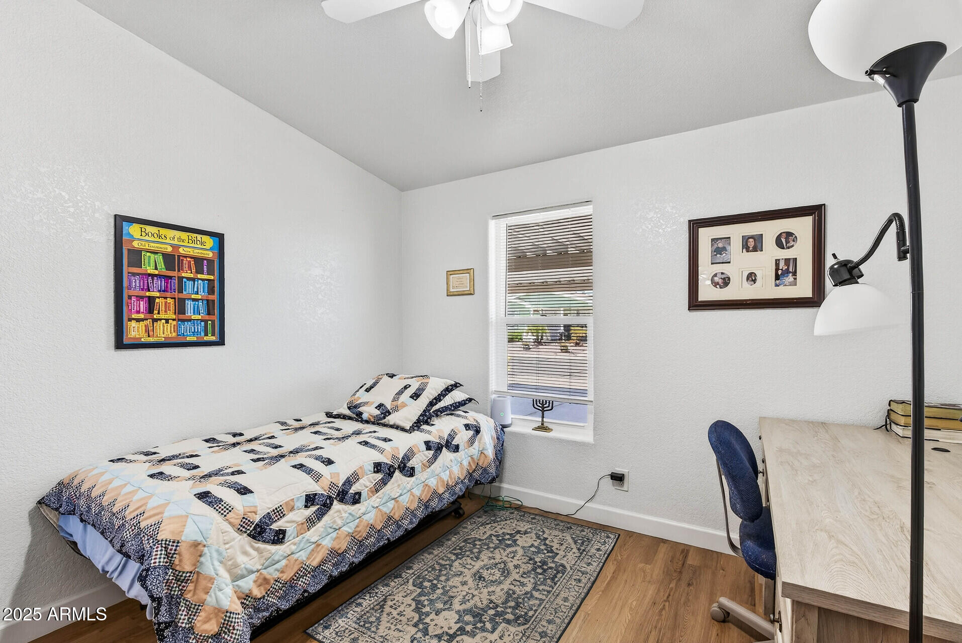 16101 North El Mirage Road, Unit 353 El Mirage, AZ 85335 - Photo 26 of 46 a bedroom with bed and a window