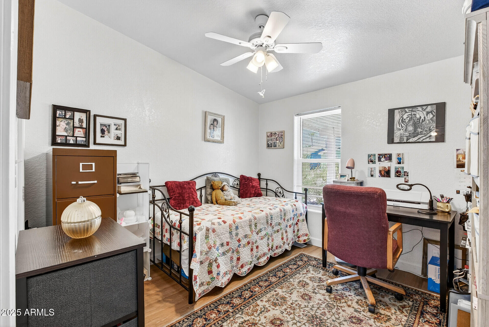 16101 North El Mirage Road, Unit 353 El Mirage, AZ 85335 - Photo 28 of 46 a bedroom with a bed and workspace