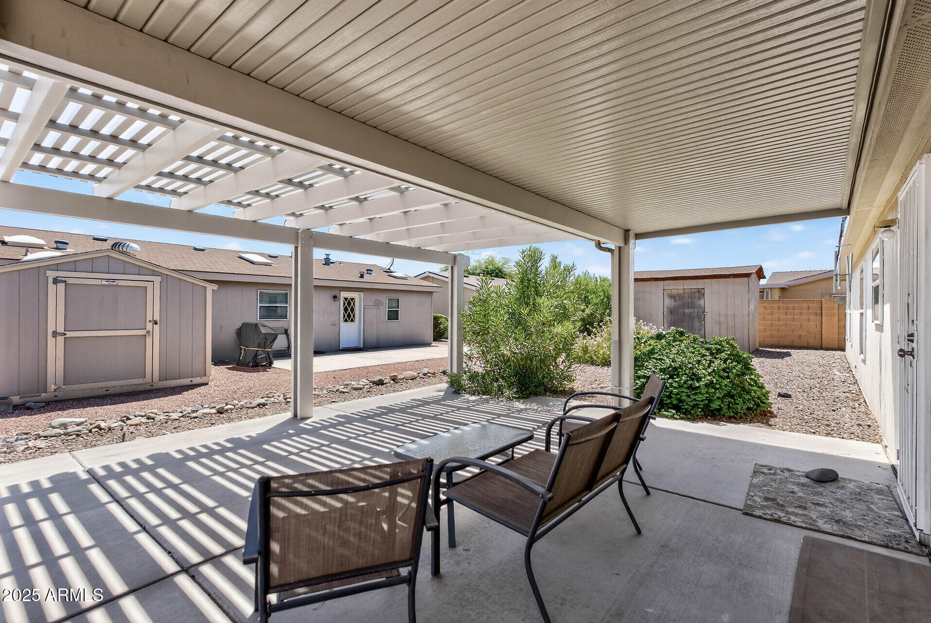 16101 North El Mirage Road, Unit 353 El Mirage, AZ 85335 - Photo 36 of 46 a outdoor space with sitting area