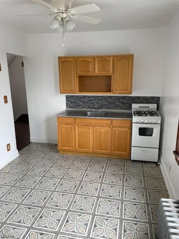 a bathroom with a sink a vanity and a mirror