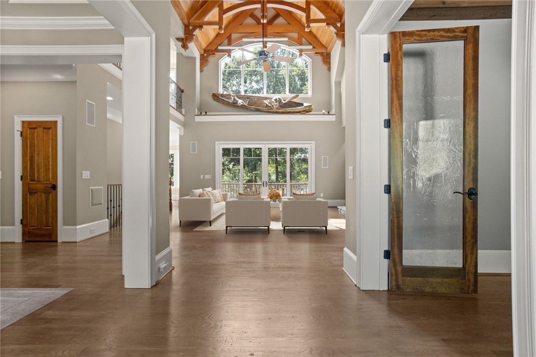 314 Palmer Way Sunset, SC 29685 - Photo 3 of 48 Gleaming hardwood floors and a vaulted, beamed ceiling anchor this inviting open foyer.
