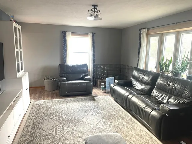 a living room with furniture and a couch