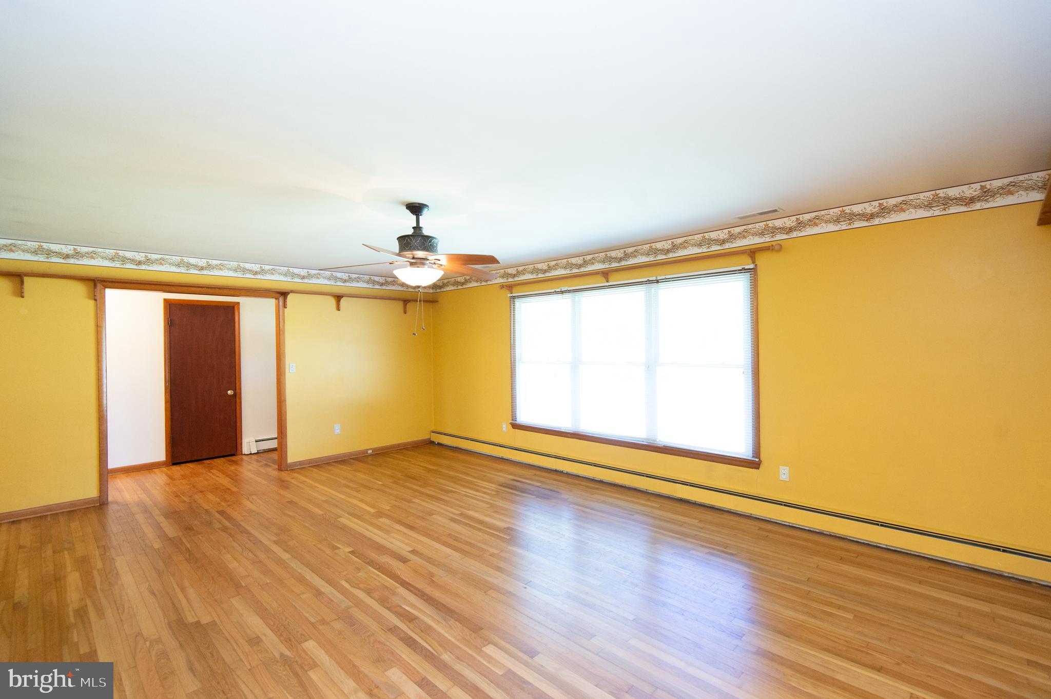 1013 Hudson Road Cambridge, MD 21613 - Photo 15 of 45 Large Living Room with Triple Windows