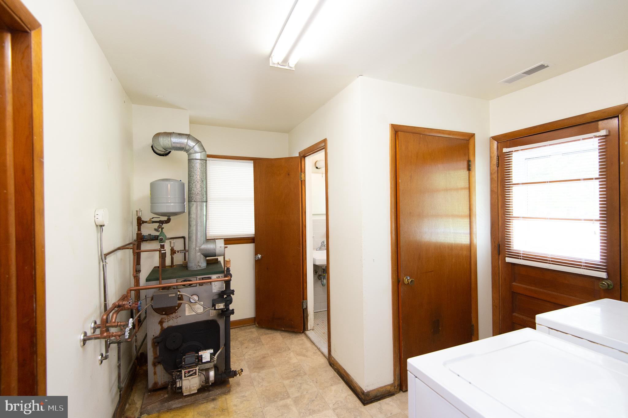 1013 Hudson Road Cambridge, MD 21613 - Photo 28 of 45 Utility Room - W/D, Furnace & Half Bath