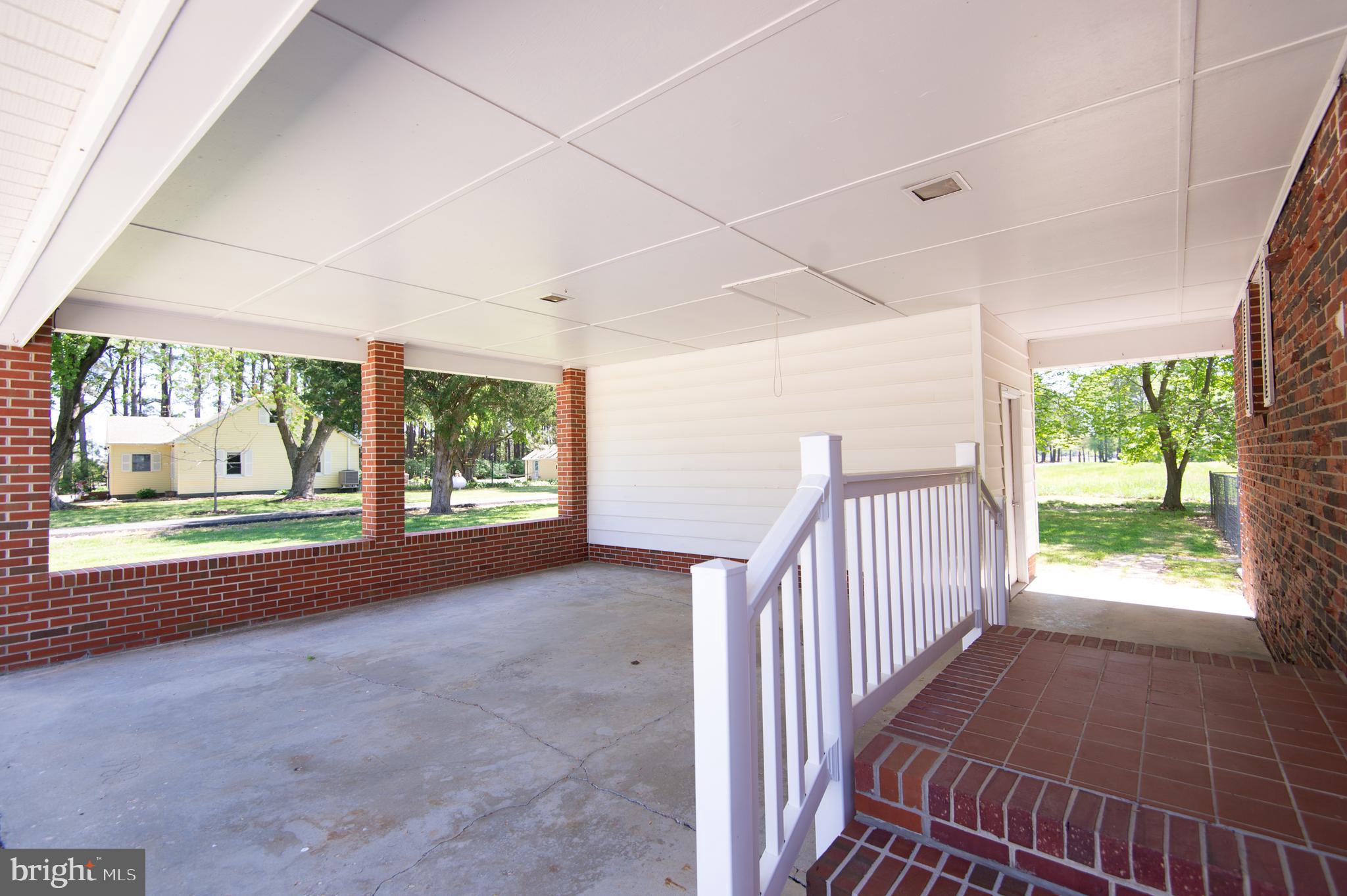 1013 Hudson Road Cambridge, MD 21613 - Photo 43 of 45 Carport with Secure Storage Room