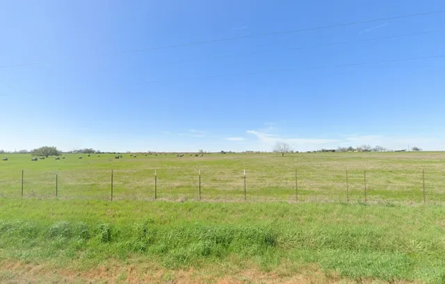 a view of an ocean and mountain