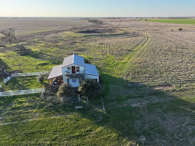 a view of a lake with a building in the background