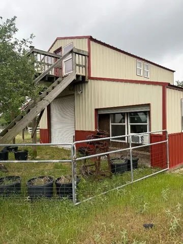 a view of a house with a swimming pool
