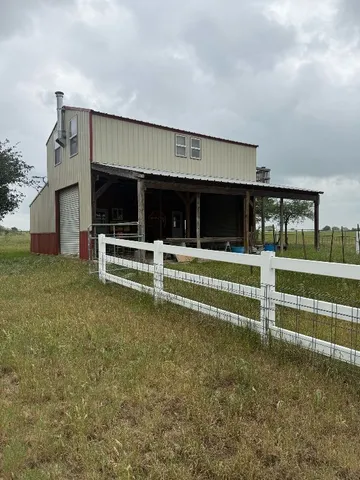 a view of a house with a park