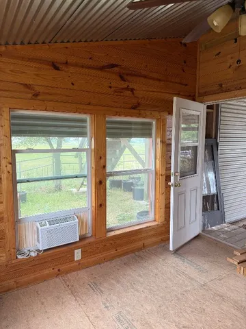 a view of a room with an outdoor space