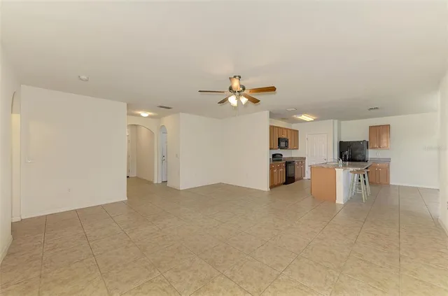 a view of a kitchen with furniture and a kitchen