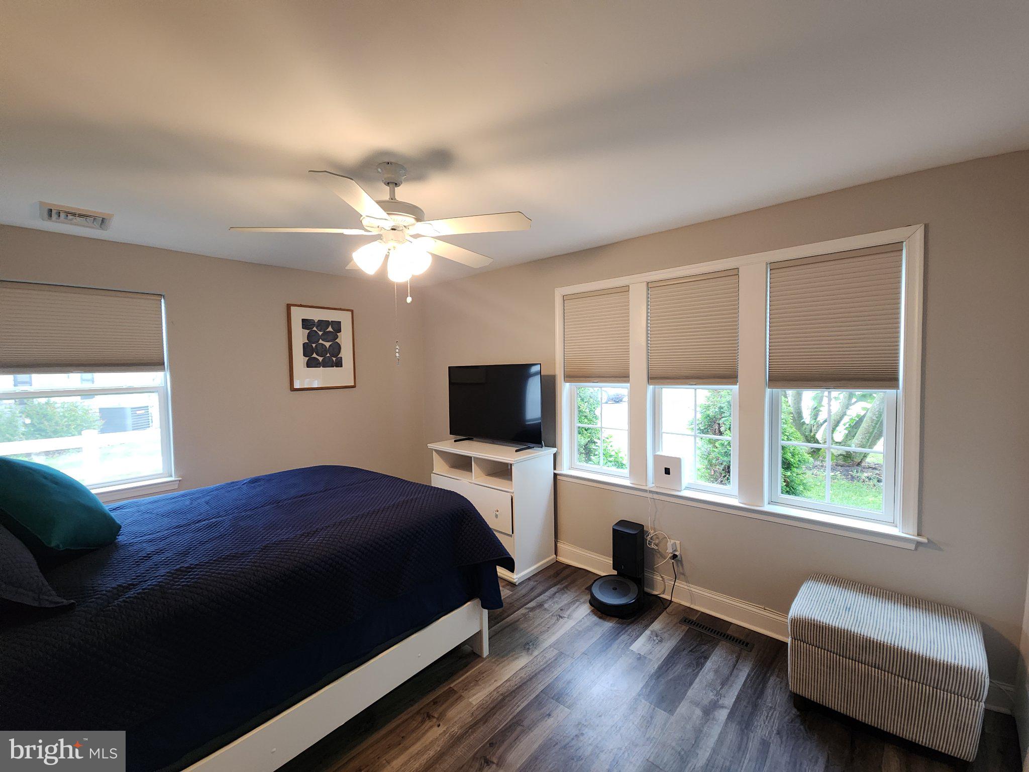 802 Devon Road Riverside, NJ 08075 - Photo 9 of 29 a bedroom with a bed and a couch