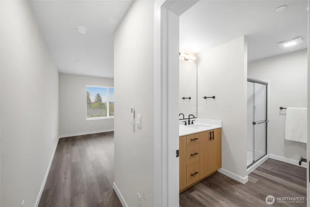 a view of a backyard with a fence