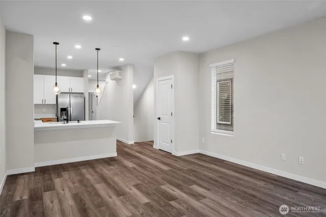 a bathroom with a shower and a sink