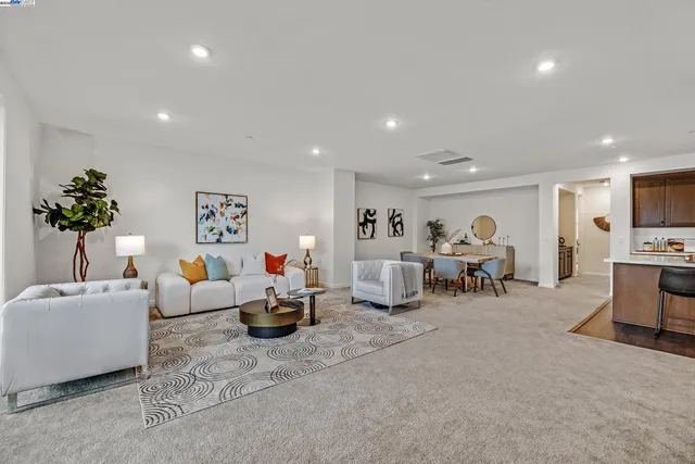 a living room with furniture and a table