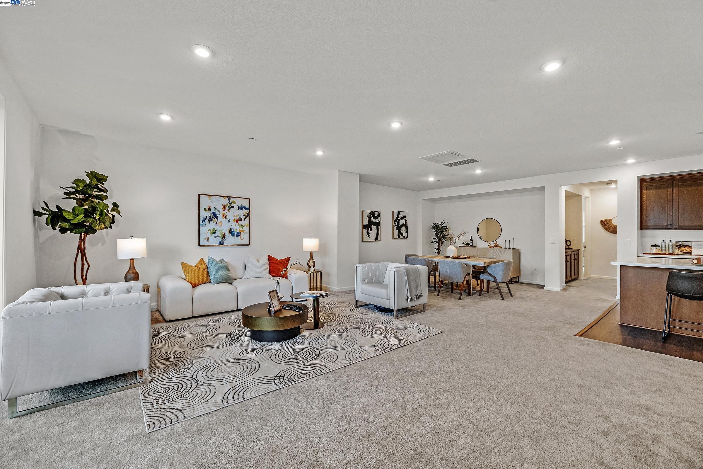 a living room with furniture and a table