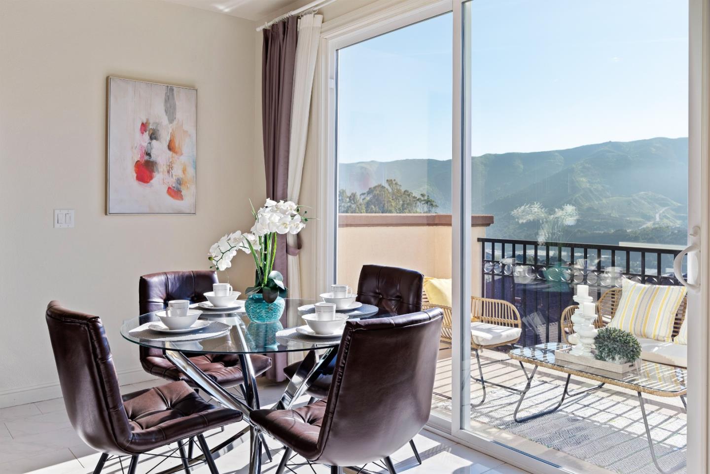 147 Elderberry Lane Brisbane, CA 94005 - Photo 15 of 56 a view of a dining room with furniture window and outside view